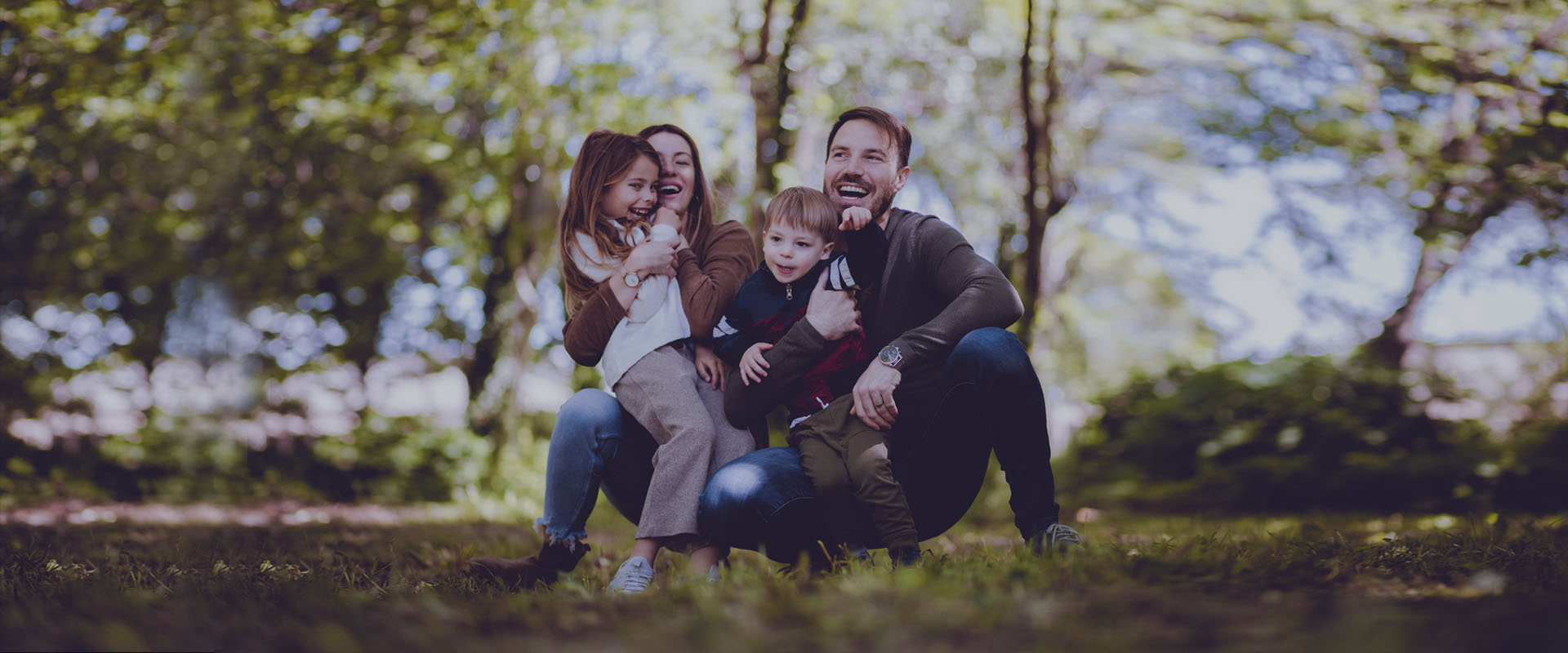 Happy family banner of Harris Orthodontics