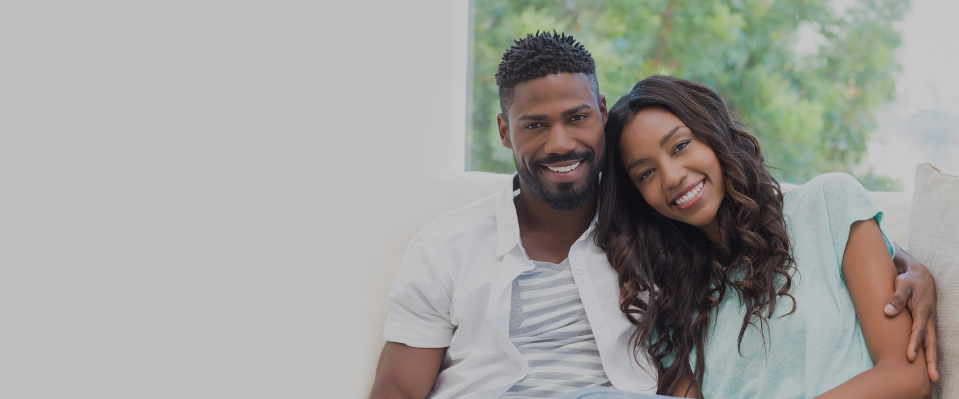 Couple smiling in Harris Orthodontics